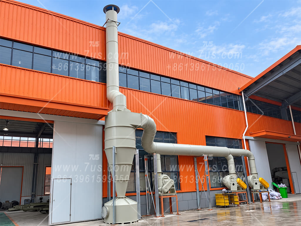 Custom polypropylene cyclone separator with a plastic collection vessel and connected ductwork at a chemical production site