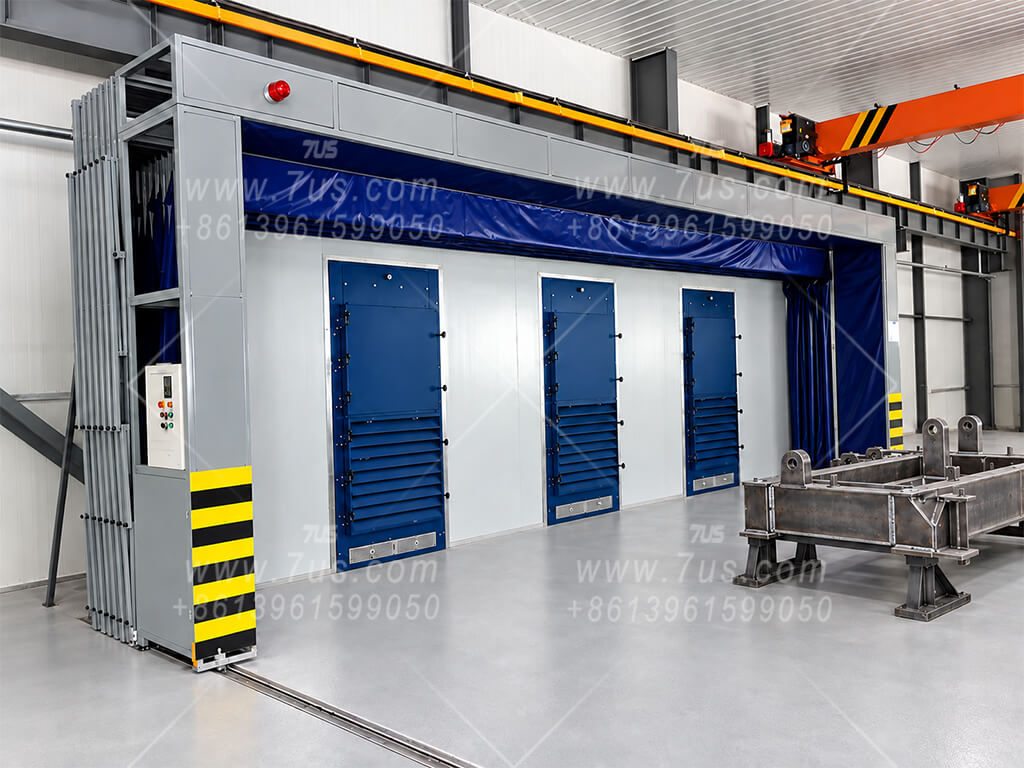 Retractable grinding enclosure in a retracted arrangement exposing the extraction module wall