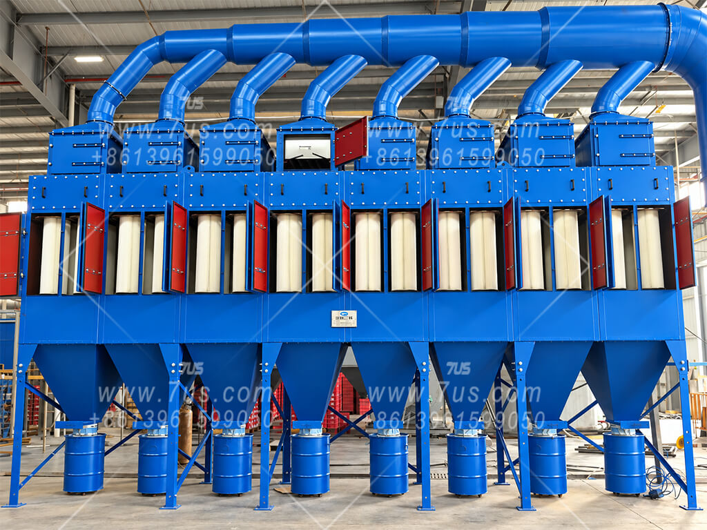 Multi-module vertical cartridge dust collector with top-mounted HEPA filter housings and open cartridge access doors