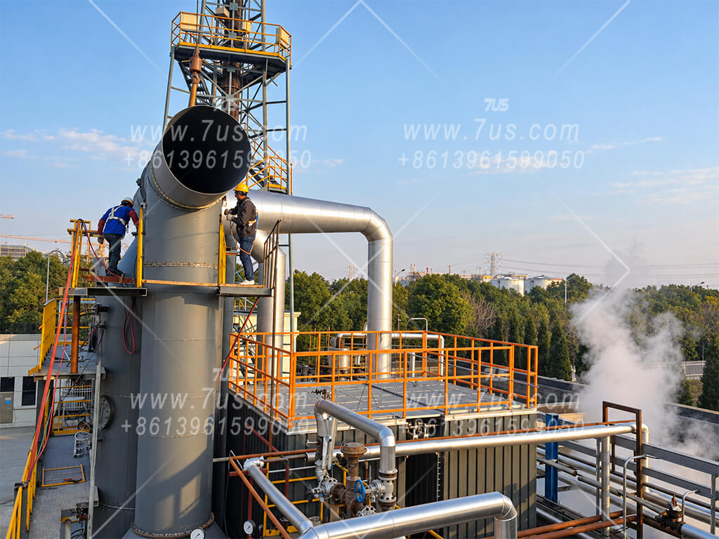 Workers installing ductwork at an industrial dust collection site