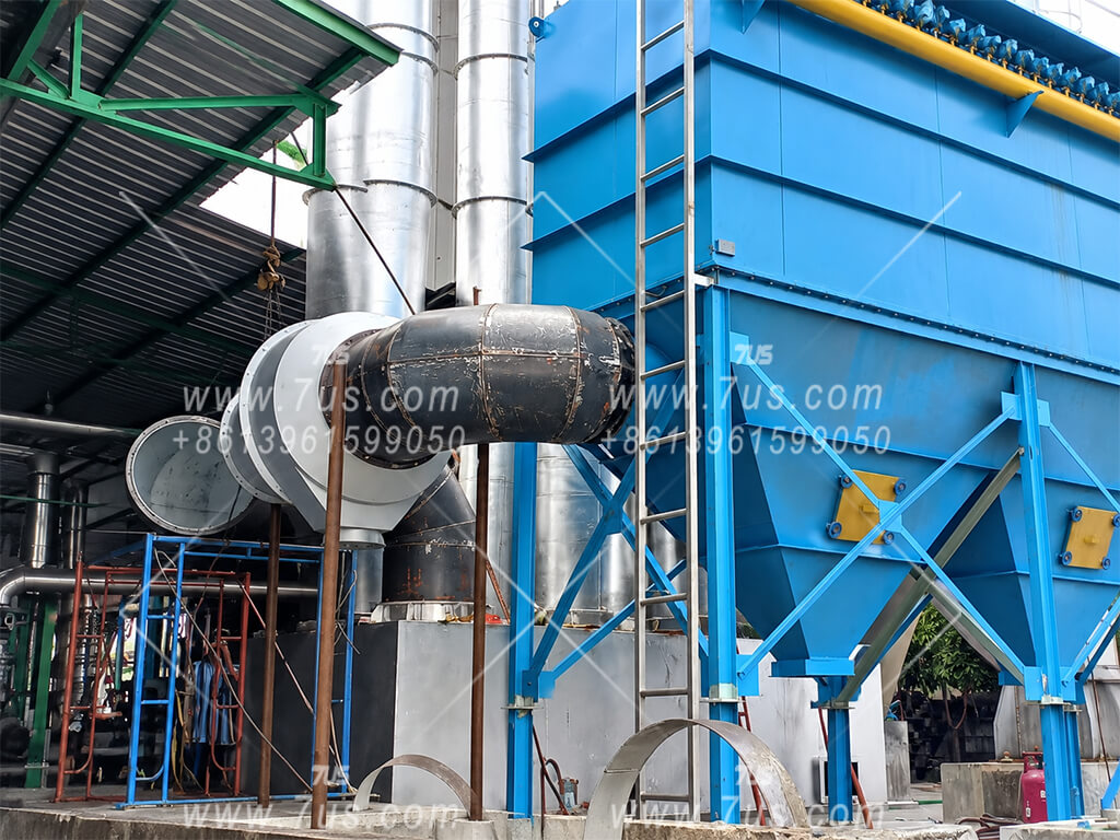 DN900 · Biomass Boiler — High-temperature spark arrestor installed upstream of a biomass boiler baghouse dust collector.