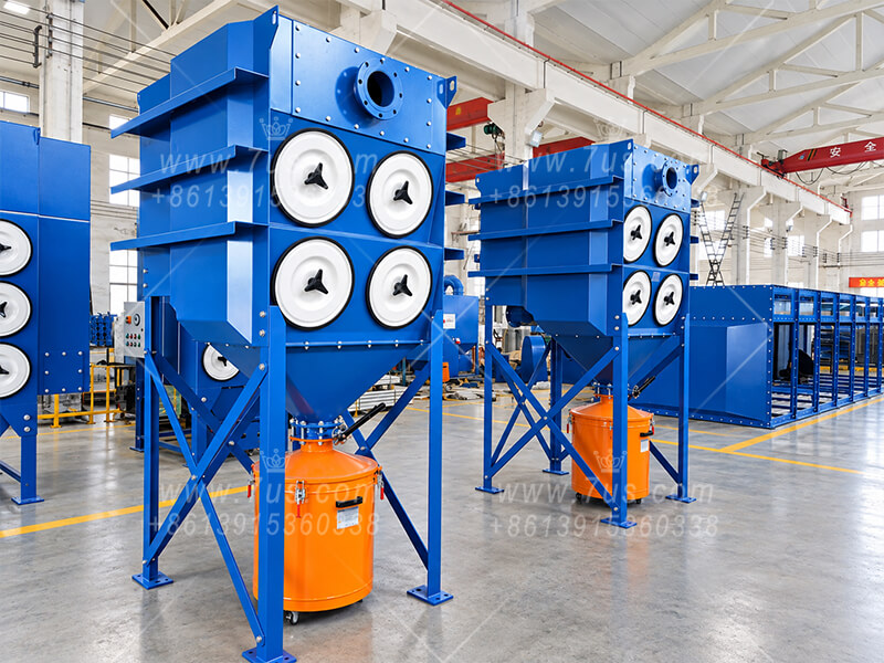 Blue cartridge dust collector assemblies in the manufacturing workshop