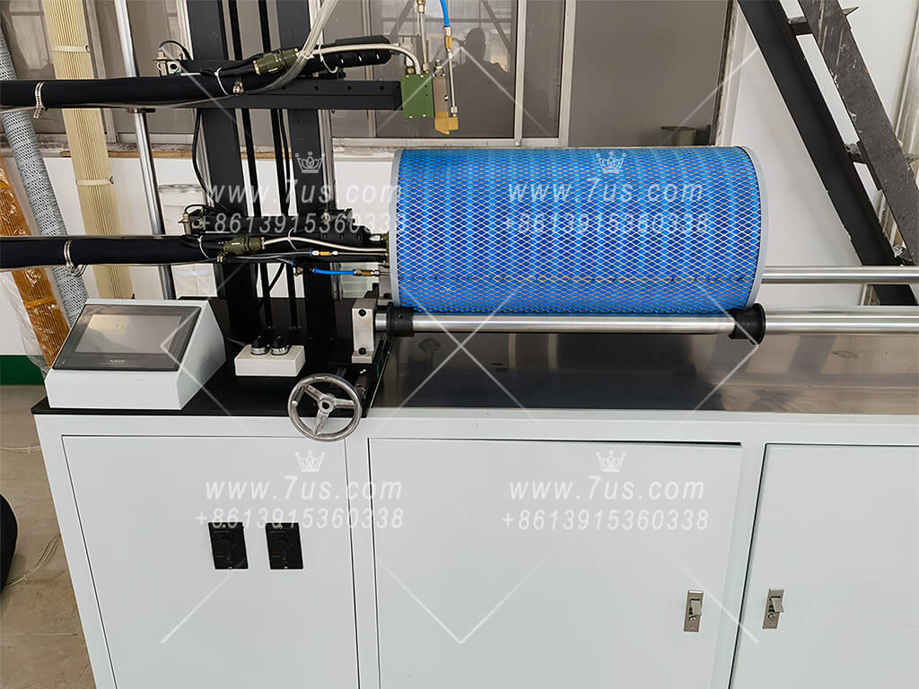 Filter cartridge production equipment